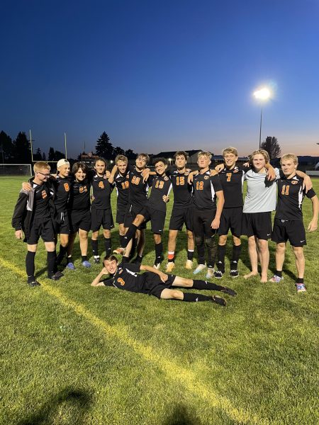 2023/2024 boys soccer team of YC High school poses for a team photo.