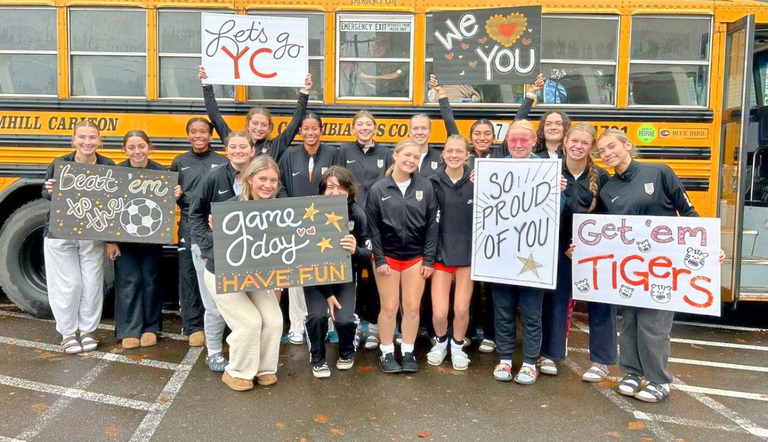 First round of playoffs for Girls Soccer Team. The team poses before getting on the bus for their away game.